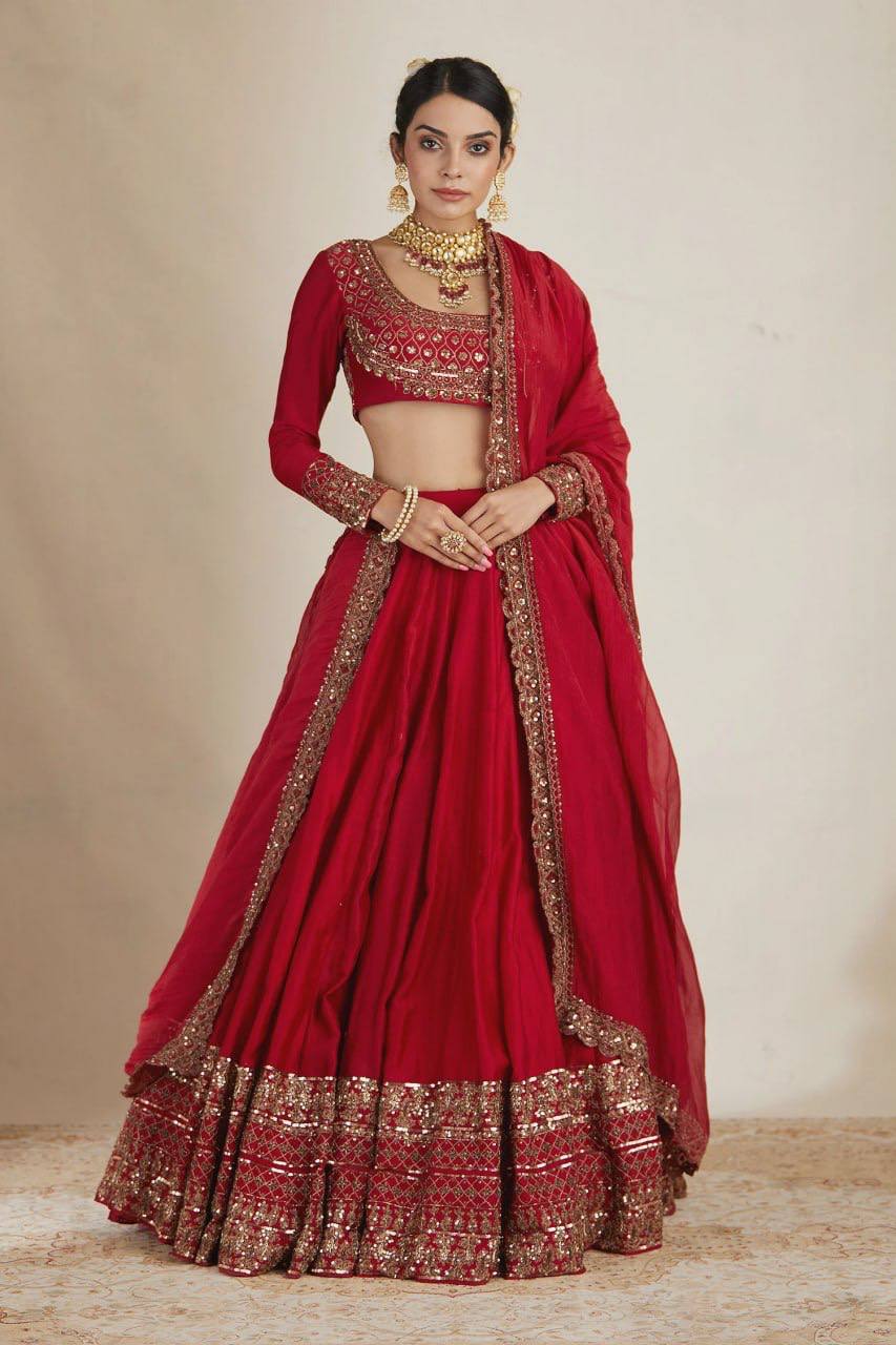 Classic Crimson Red Bridal Lehenga Choli Featuring Opulent Gold Zari Embroidery and Scalloped Borders